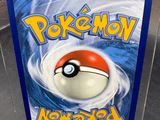a close up of a box with a pokemon figure inside of it