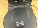 a coffee maker that is sitting on a wooden table