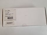 an open white box with a black and white sticker on it