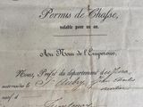 an old document with writing on it sitting on top of a table