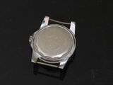 a watch that is sitting on a black surface