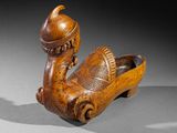 an old wooden shoe with a hat on top of it