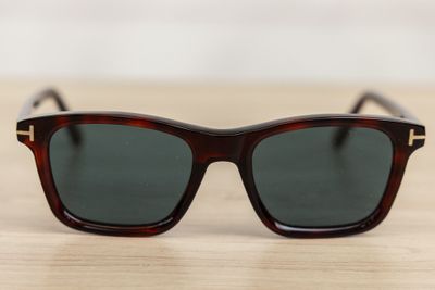a close up of a pair of sunglasses on a table