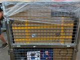 a large metal cart with a bunch of boxes on it