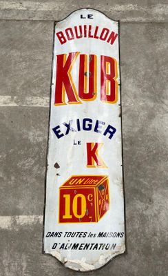 a sign on the side of a building that says kub