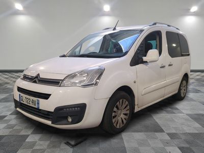 the white van is parked on a checkered floor in a room