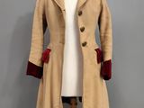 an image of a woman ' s coat on a mannequin mannequin