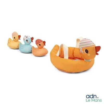 three stuffed animals in a row on a white background