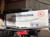 a box that is sitting on top of a pile of tools