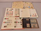 many different types of stamps on the pages of a book