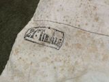 a close up of a piece of cloth with a stamp on it