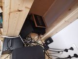 a picture of a computer desk with a lot of wires on it