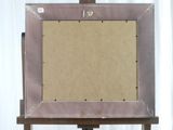a picture of an easel with a picture on it