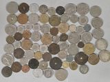 a lot of coins that are on the table
