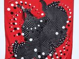 red and black polka dot print scarf with black and white polka dots on a red background