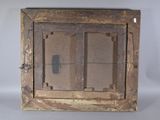 a picture of an old wooden frame with a glass door