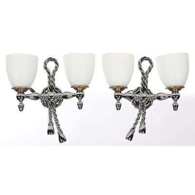 three light wall sconces with rope arms and white glass shades