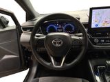 the interior of a car with a steering wheel, dashboard, and display screen