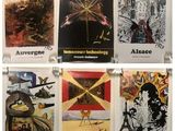 plusieurs affiches représentant différents types d'art accrochées à un mur