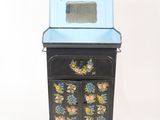 a small cabinet with a mirror on top of it