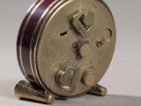 a small clock that is sitting on a table