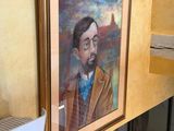 a painting of a man with a beard on the wall