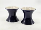 pair of black and white ceramic salt and pepper shakers