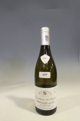 a bottle of wine that is sitting on a table