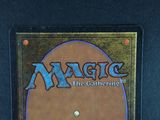 the back cover of a card game with a picture of a man on a horse