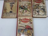four children ' s books are lined up on a white surface