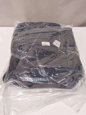 a plastic bag that has a black shirt in it