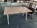 tables and chairs in an office with glass walls and blue carpet