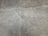 a close up of a piece of leather on the floor