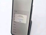 an image of a cell phone sitting on top of a table