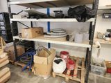 a lot of boxes on the shelves in the room