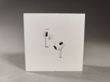 a white box with a pair of airpods on it