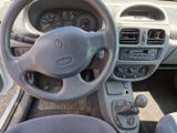 dashboard of a car with a steering wheel and dashboard controls