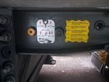 a close up of a car dashboard with a thermometer
