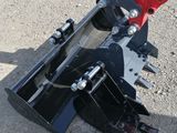 a small machine that is sitting on the ground