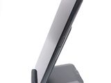 a cell phone that is sitting on top of a stand