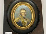 portrait d'un homme en uniforme militaire dans un cadre en bois