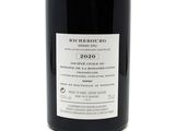 a bottle of wine that is sitting on a table