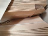 a large pile of cardboard sitting on top of a table