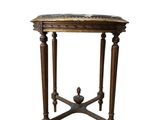 an image of a small table with a marble top on a white background