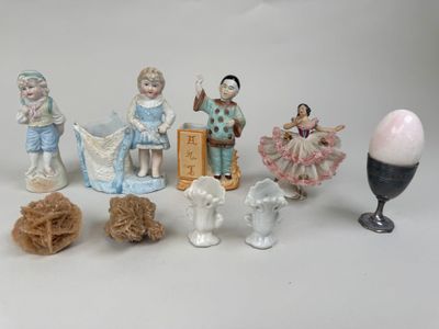 many figurines that are sitting on a table