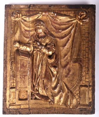 une image représentant une plaque en or sur laquelle figure Jésus