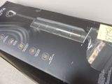 packaging of a hair dryer sitting on top of a cardboard box