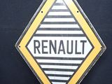 panneau jaune et noir portant l'inscription « Renault » sur fond noir