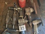a lot of tools that are sitting on a table