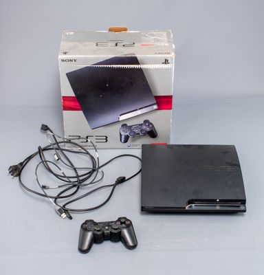 une boîte contenant une manette de jeu et une manette de jeu